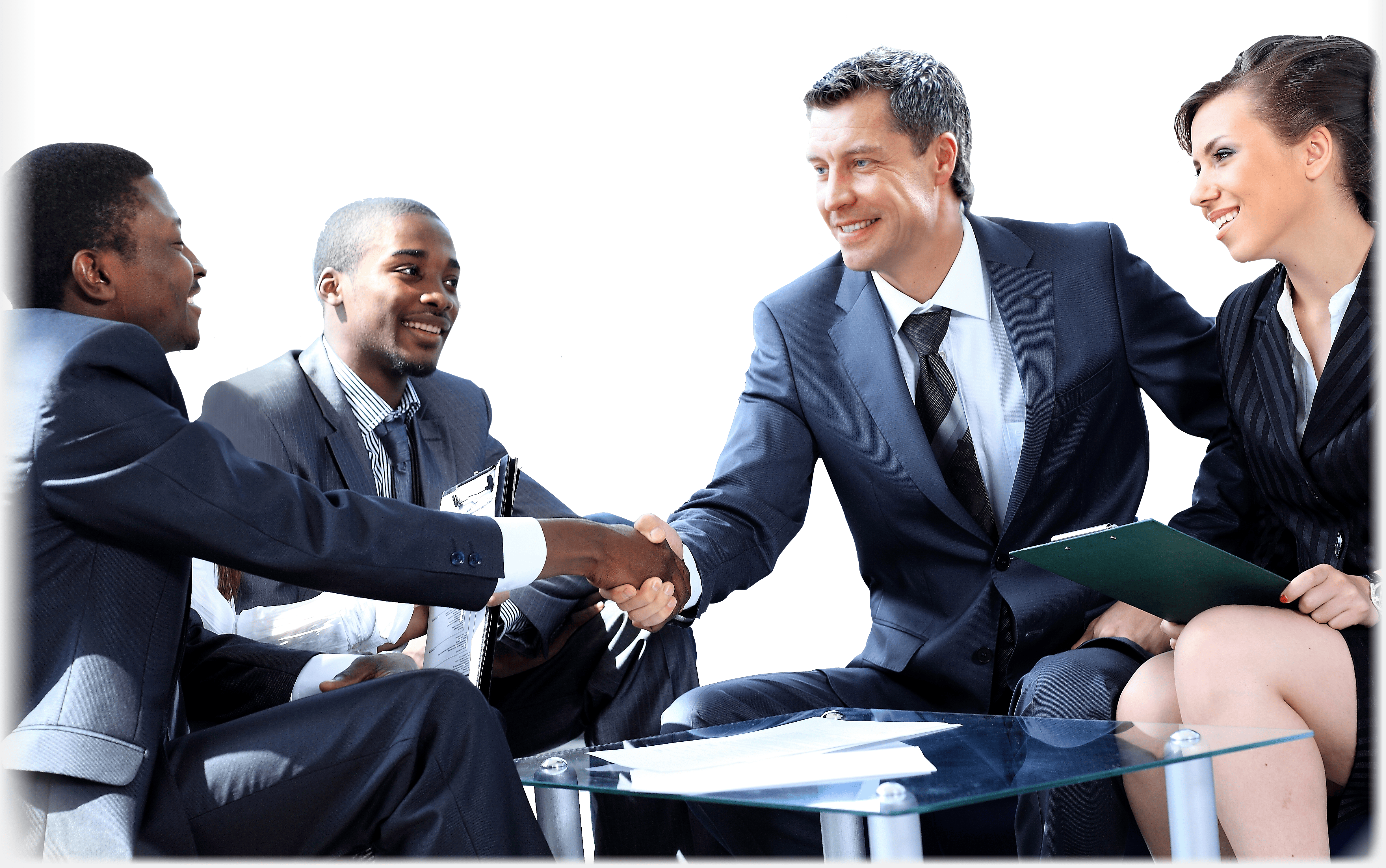 Four business people sitting around a table